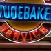 New Studebaker Authorized Service Porcelain Sign with Neon 48 IN Diameter