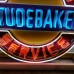 New Studebaker Authorized Service Porcelain Sign with Neon 48 IN Diameter