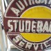 New Studebaker Authorized Service Porcelain Sign with Neon 48 IN Diameter